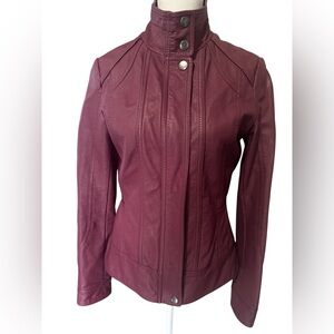 Ricki’s pleather jacket in a wine color, Size 4, gently used condition.